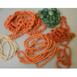 A graduated antique coral bead necklace to/w a long coral bead necklace, 146 cm,