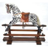 An early 20th century rocking horse by F Ayres,