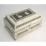 A 19th century Indian pierced bone-veneered casket with incised and painted decoration,