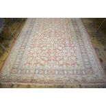 A Turkish carpet, the Ziegler design on pale terracotta ground, 2.85 x 1.