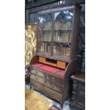 A George III mahogany cylinder top bureau bookcase,