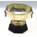 A heavy quality silver octagonal rose-bowl with lion mask and ring handles, on flared foot,