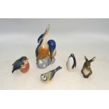 Five Royal Copenhagen models - Kingfishers, no 1769; Penguin, no 3003; Rabbit, no 1019; Bluetit,