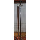 A Royal Artillery sword with 88 cm etched blade, open work basket hilt and wired fishskin handle,