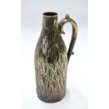 A Victorian Mappin Brothers EPNS wine-bottle holder with hinged two-piece bark-effect body and