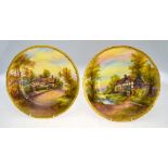 An associated pair of Royal Worcester dishes; one decorated with Anne Hathaway's cottage;