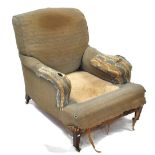 An antique Harley model easy armchair by Howard & Sons Ltd, London, the seat 73 cm deep,