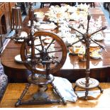 An antique fruitwood tripod spinning wheel 90 cm high overall to/w a tripod wool winder (2)