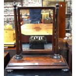 A large Regency figured mahogany platform mirror,