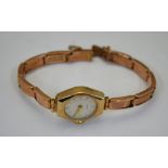 A lady's 9ct gold Mirco wristwatch with 15-jewel Swiss movement on flexilink bracelet strap, 14.