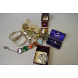 A box containing various items of silver jewellery including bangles,