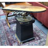 A rare 19th century compass adjusters table with tilting teak platform on revolving adjustable