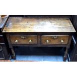 A late 17th century joint oak side table, with pair of deep frieze drawers raised on turned legs,