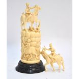 An Indian ivory sculpture, designed with four horsemen, about 15 cm high,