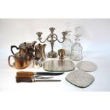 An EPNS four-piece hotel plate tea service, to/w a candelabra, place-mats,