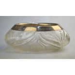 An Edwardian heavy quality cut glass oval bowl with silver rim, John Grinsell & Sons, London 1903,