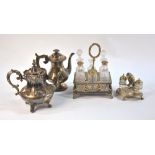 A nickel (ex-plate) three-piece cruet stand surmounted by a parrot with glass eyes, 12 cm high,