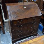 An 18th century mahogany bureau,