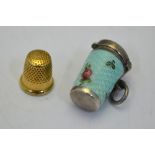 A 9ct gold miniature thimble, Birmingham 1965,