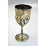 A silver half-reeded goblet with beaded blade-knop stem on flared foot, William Hutton & Son,