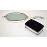 A Swedish hand-mirror with double-sided plates and top ring-hanger, .