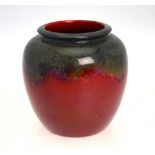 A Bernard Moore flambe decorated oviform vase; 12 cm high;