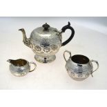 A Victorian silver bullet-shaped teapot,
