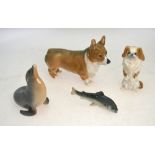 Four Royal Copenhagen models - Corgi, no 4593; Pekingese, no 1776; Sealion, no 1441; Trout (small),