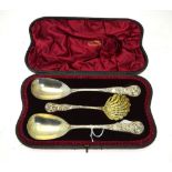 A Victorian cased set of heavy quality parcel gilt and silver serving spoons,