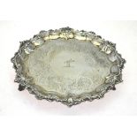 A William IV silver letter salver with chased shell and scroll border and engraved decoration on