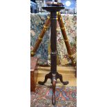 A 19th century mahogany tripod jardiniere stand 102 cm high x 25 cm diam