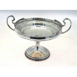 A heavy quality silver tazza with twin scroll handles, on knop stem and flared foot, 16.
