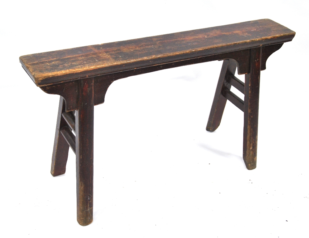 A Chinese stained pine bench, late 19th century,