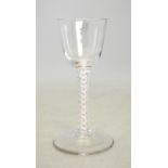 A 19th century cordial glass having a round funnel bowl, opaque twist stem,