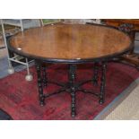 A Victorian aesthetic period ebonised and burr walnut centre table,