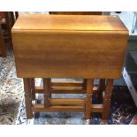 Wilf 'Squirrel Man' Hutchinson, a golden oak gateleg table,