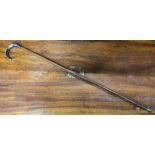 A Belle Epoque hickory walking stick with electroplated handle modelled as a warrior's head with
