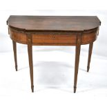 A George III figured mahogany tea table,