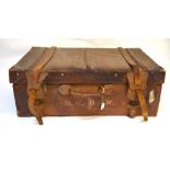A vintage leather travelling trunk with red fabric lining Condition Report Scuffed