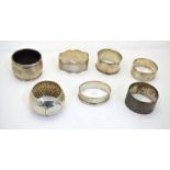 Six Edwardian and later silver napkin rings, 3.