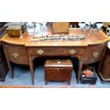 A George III satinwood crossbanded mahogany sideboard of breakfront form,