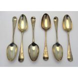 A matched set of six mid-Georgian silver Hanoverian pattern table spoons (later engraved crests),