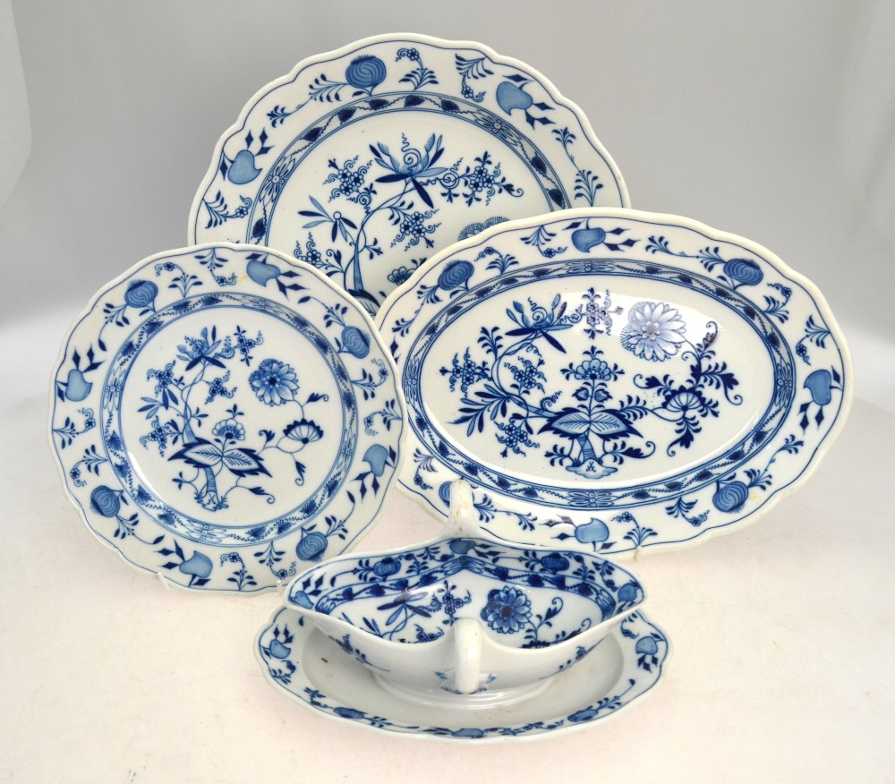 A Meissen blue and white onion pattern dinner service comprising 13 x 24 cm plates;