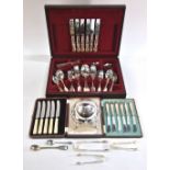 A canteen containing a set of electroplated fiddle and shell flatware for six,