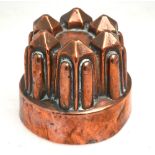 A Victorian copper circular jelly mould, stamped '479', 10.