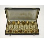 A German cased set of twelve gilt coffee spoons,