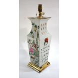 A famille rose vase of square tapering section, decorated with text,