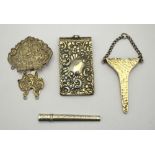 A Victorian silver chatelaine clip, finely-chased with figures, London 1893,