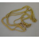 A 9ct curb guard chain approx 140 cm long,