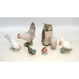 Seven Royal Copenhagen bird models - Hen, no 1024; Cock head down, no 1127; Duck, no 1192; Owl,